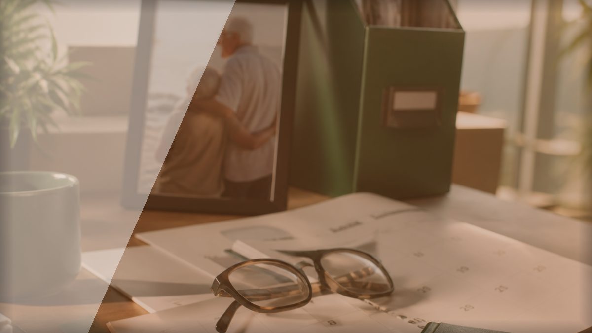 Calendar and glasses on a desk