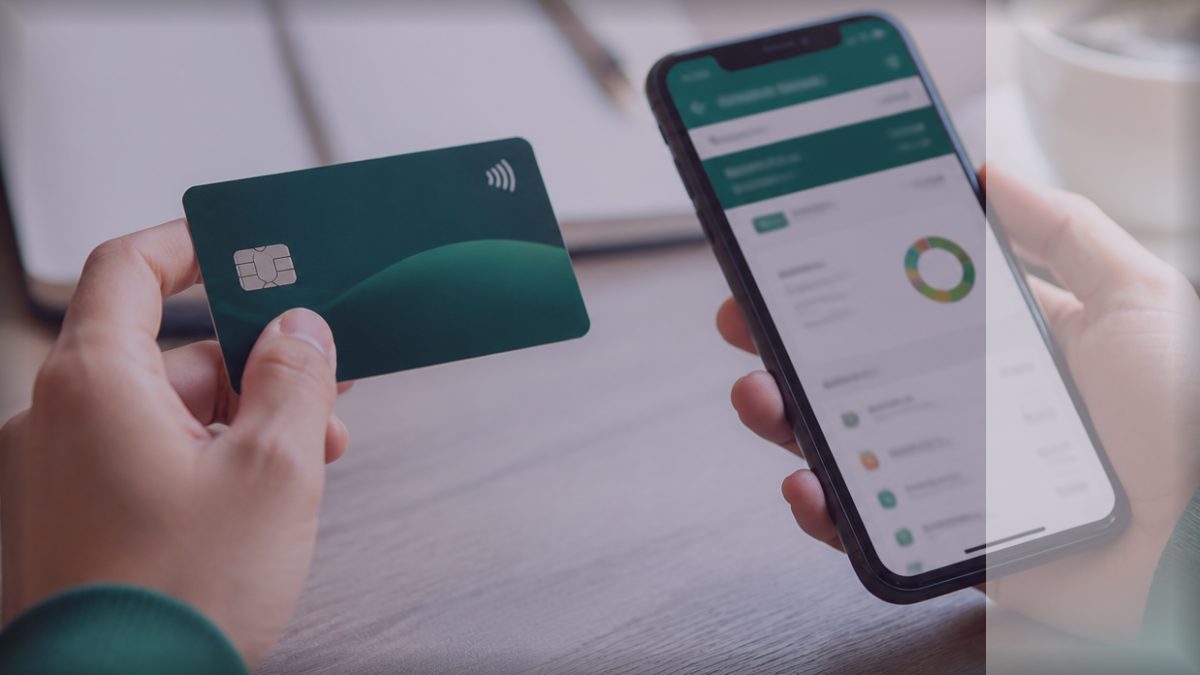 Credit card and phone on a desk